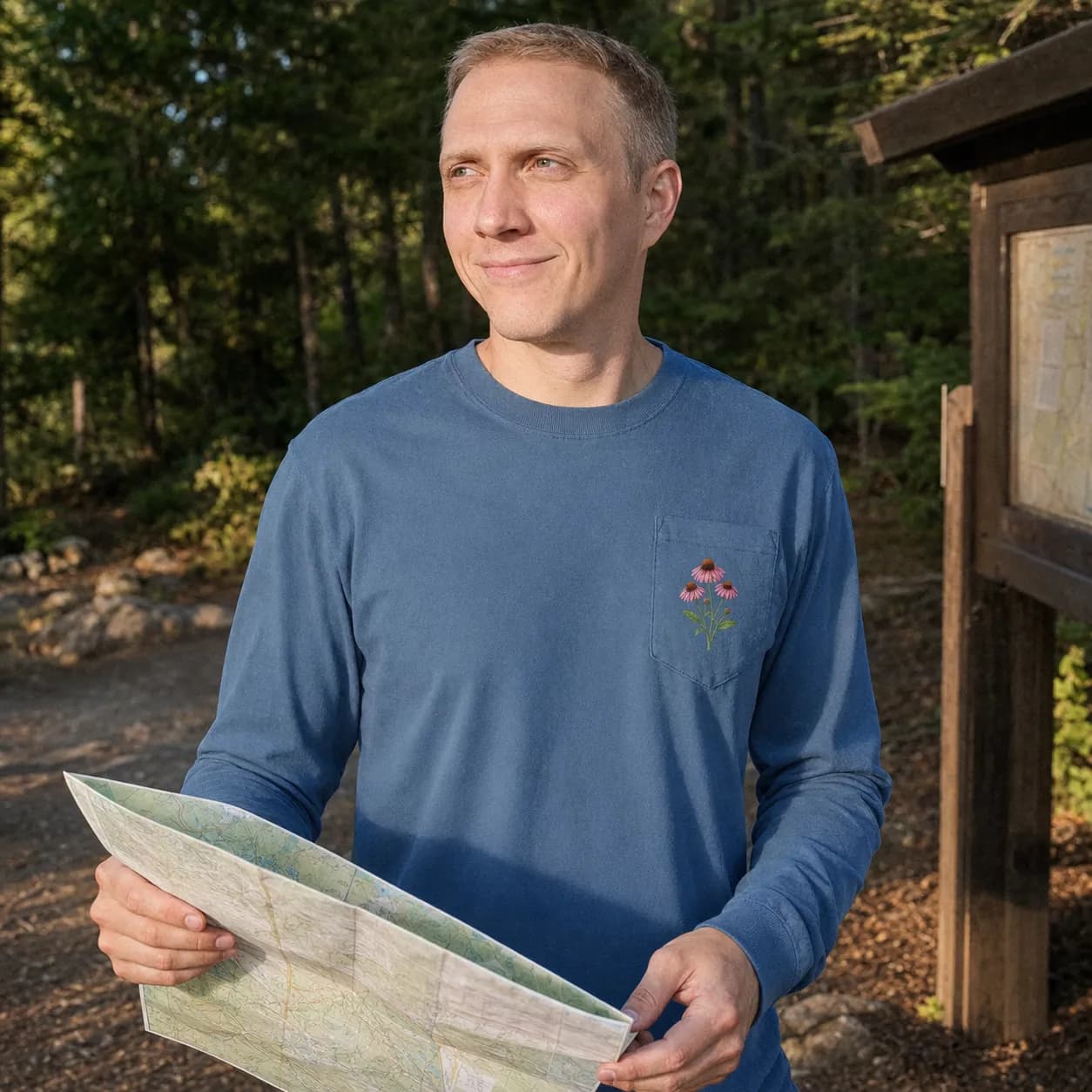 A man in a blue long-sleeve shirt with a small floral chest print holds a map outdoors. AI-generated promotional image.