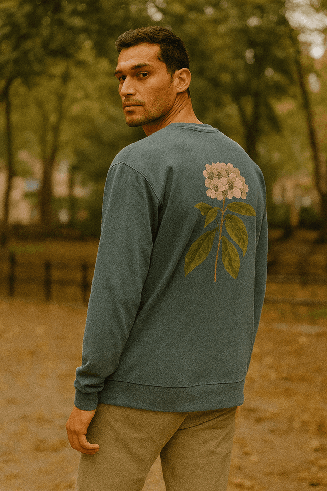 Model wearing custom botanical t-shirt in urban park